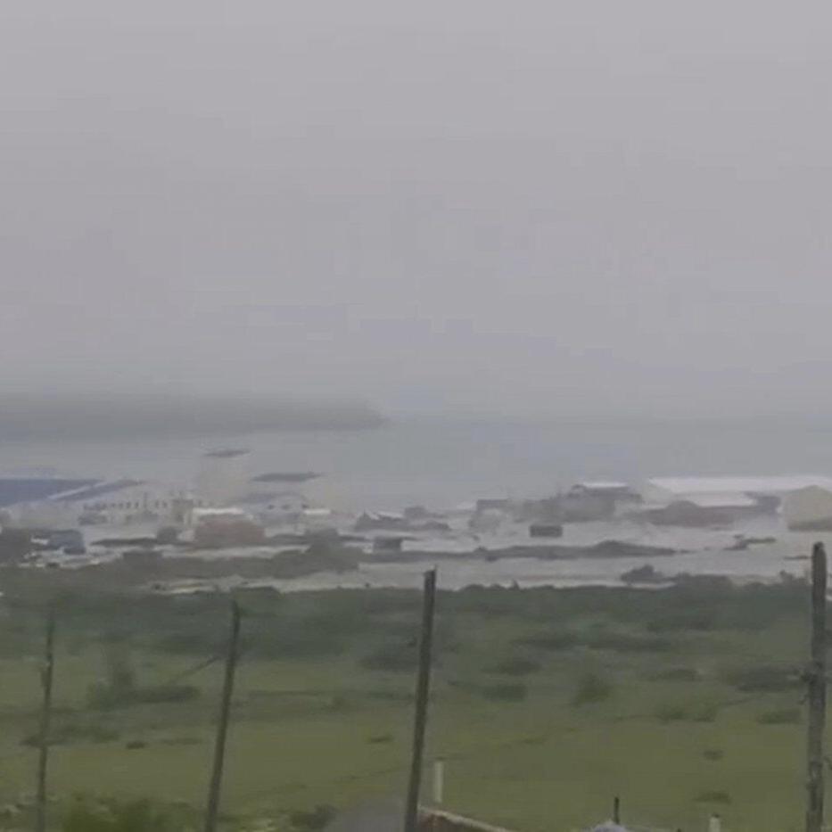 The Latest: Tsunami warnings lifted in most places